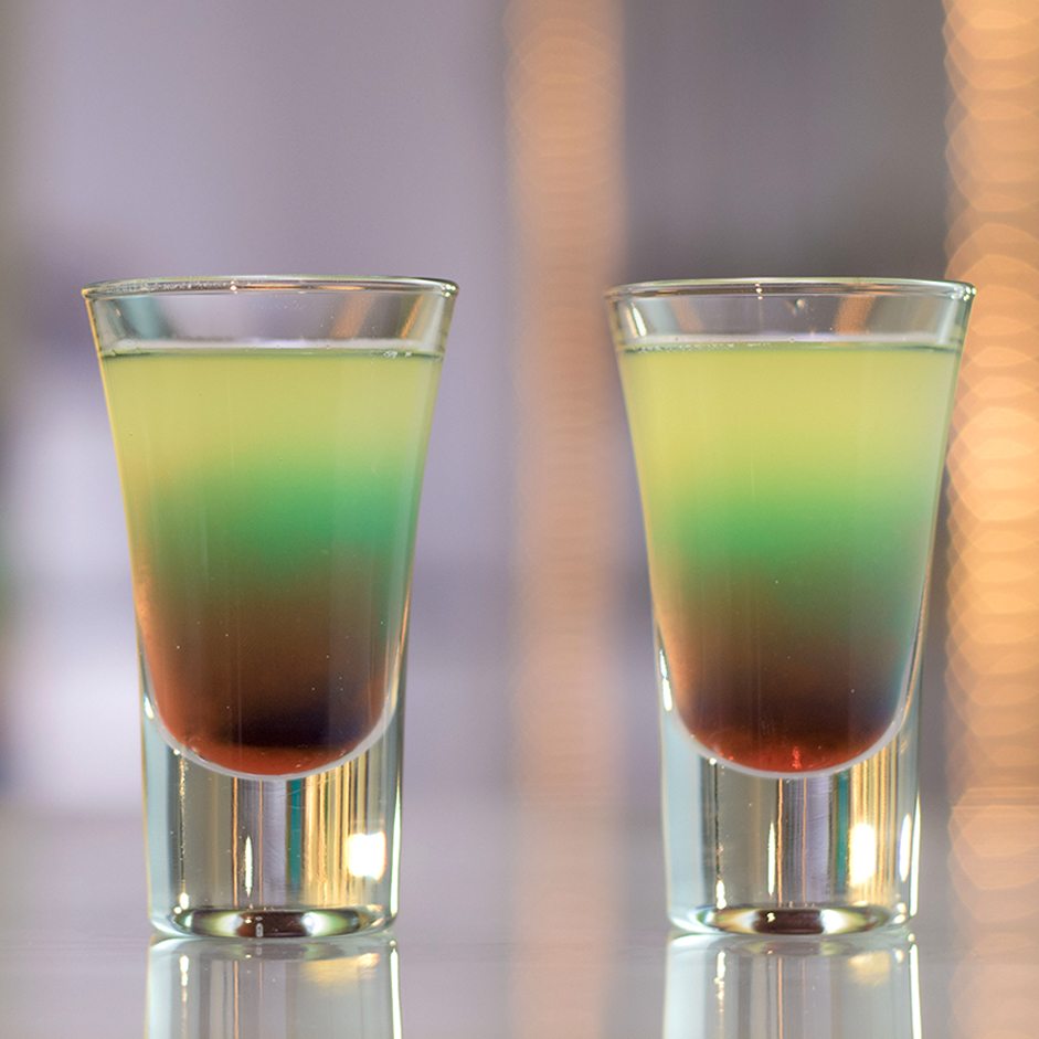 make a Captain on Acid cocktail with Blue Curacao, Spiced Rum, Coconut Rum,...